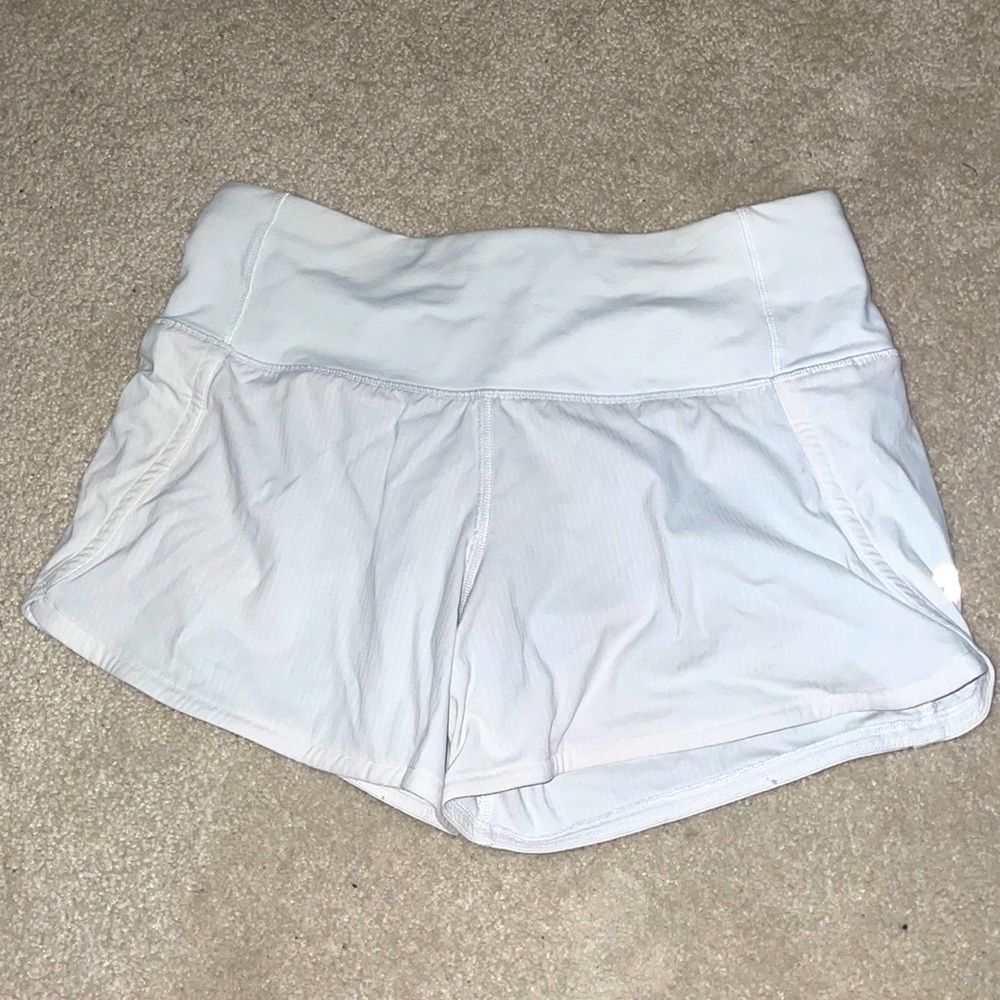 White size 0 lulu shorts. Only worn twice.